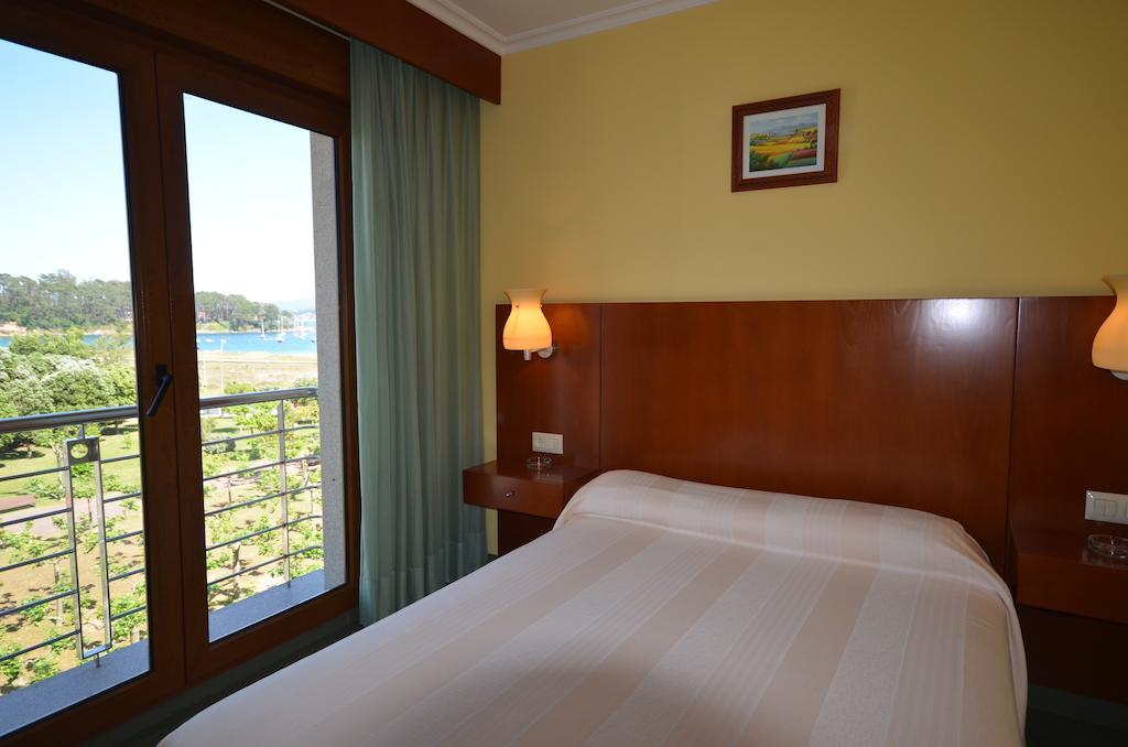 Hotel Maracaibo Portonovo Quarto foto